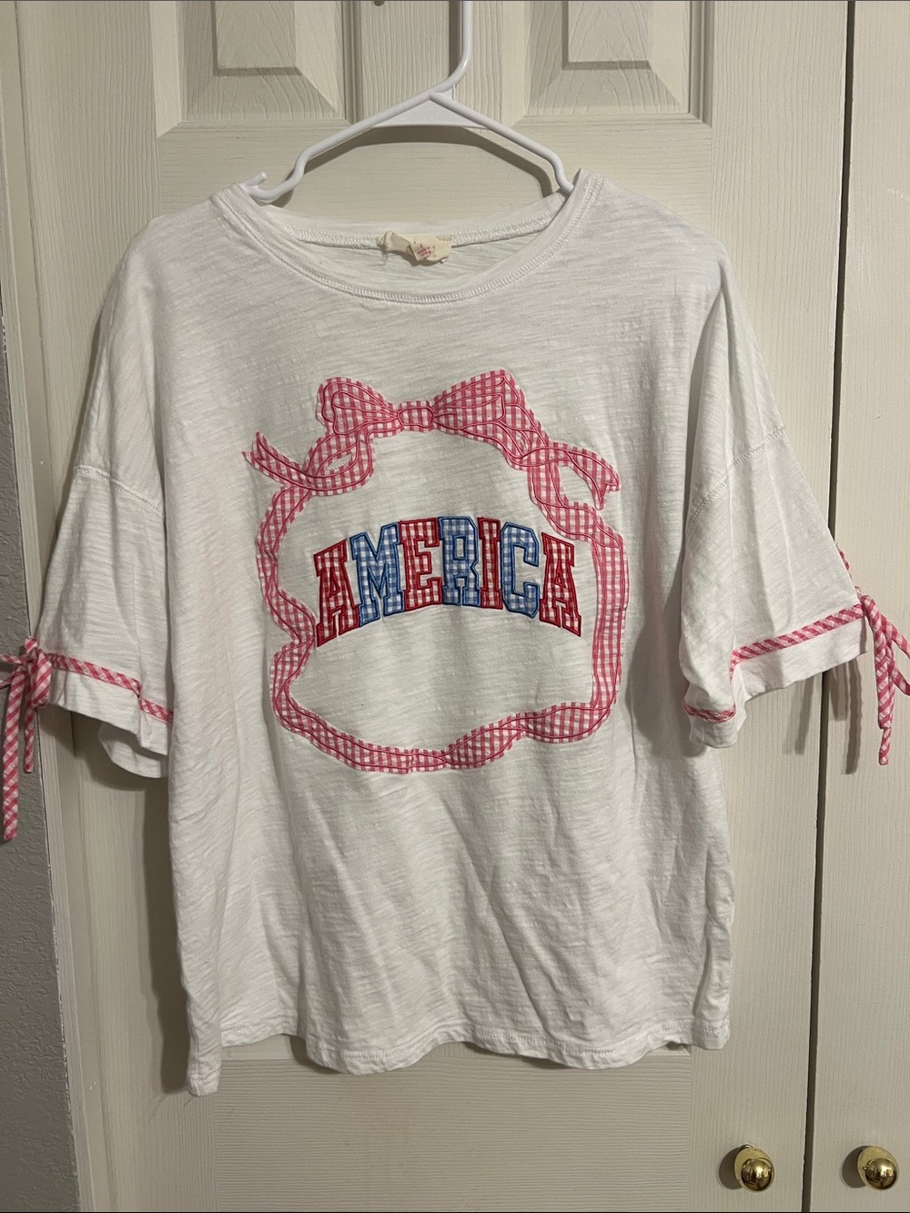Peach Love Women’s white  'America' embroidered Graphic Tee with